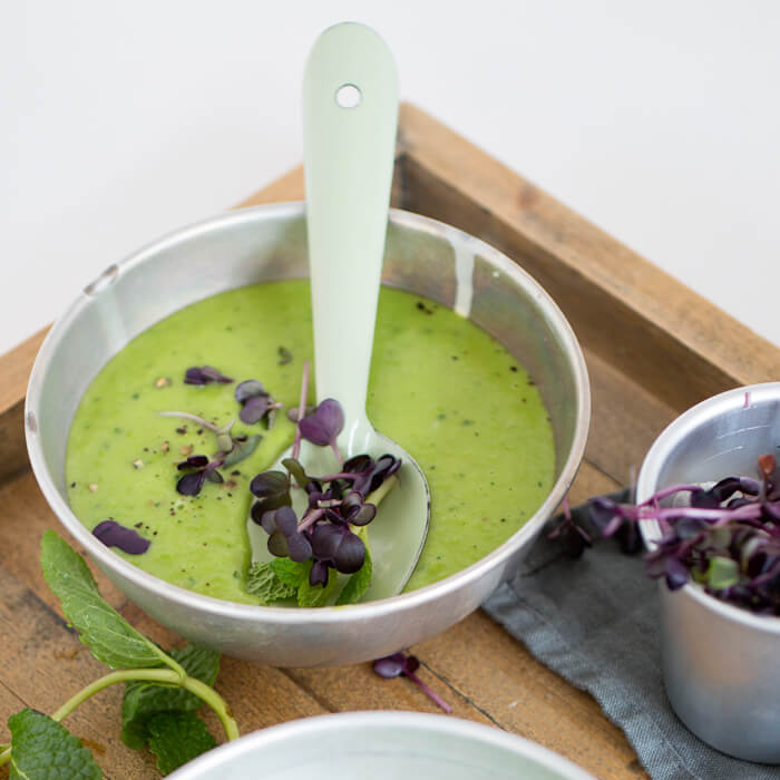 green pea soup with mint and microgreens
