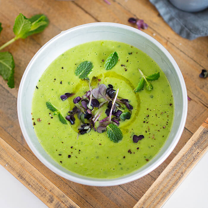 green pea soup with mint and microgreens