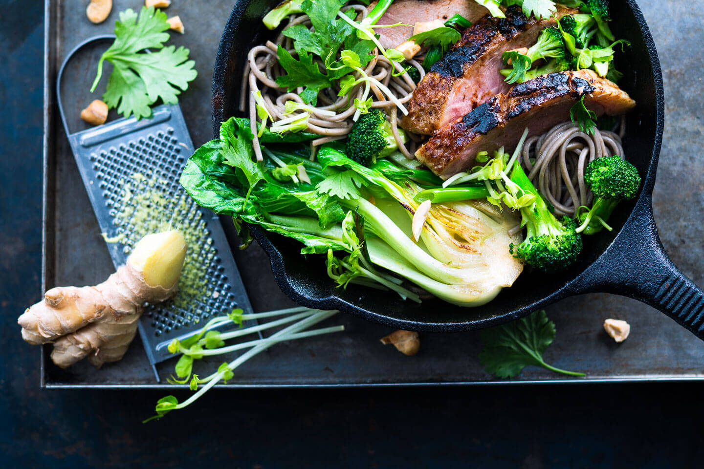 Asian duck stir fry with noodles in a pan